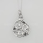The Inishglora Triskele Pendant features an intricate, openwork circular design based on a traditional triskele motif.