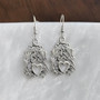 The Mìn Earrings features thistles, leaves, a trinity knot and a heart.