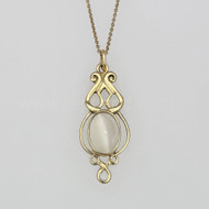 The Fadó Gem Pendant, shown in yellow gold with Moonstone.