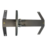 Functional impact view of steel target flipping backward on spring mechanism after .338 Lapua Magnum shot, demonstrating automatic reset system in action.