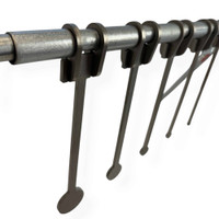 CNC laser-cut AR400 steel KYL rack components including spacers and mounting brackets assembled on portable shooting stand system.