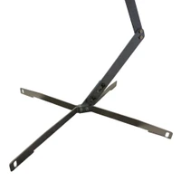 Functional impact view of rifle round striking angled steel plate, demonstrating downward deflection of bullet splash for improved shooter safety at close range.