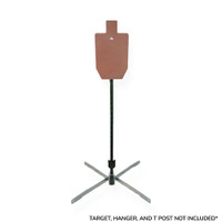 Installed T-post target stand holding steel silhouette plate in rocky terrain, showing stable low-profile setup for handgun and rifle training drills outdoors.
