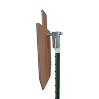T-Post Hanger sliding over standard 1.25 inch T-post for quick tool-free steel target installation at shooting range