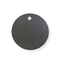 CNC laser-cut 3/8 inch AR500 steel round target mounted on range stand for pistol and carbine training at outdoor shooting range with clean strike surface