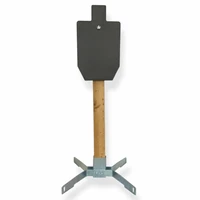 Complete AR500 static target package mounted on 2x4 stand with steel hanger and round target set up at outdoor shooting range for rifle and pistol training