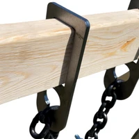 DIY range stand assembly using 2x4 lumber with hybrid brackets and chain-mounted steel gong installed for portable shooting practice setup.