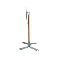 Outdoor shooting range setup featuring AR550 static target package mounted on 2x4 wood post for precision marksmanship and defensive firearm drills