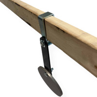 Steel target mounted with rubber strap hanger showing impact swing motion