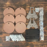 Steel plate striking motion captured mid-swing after rifle impact, showing reactive movement and audible feedback from hanging target system.