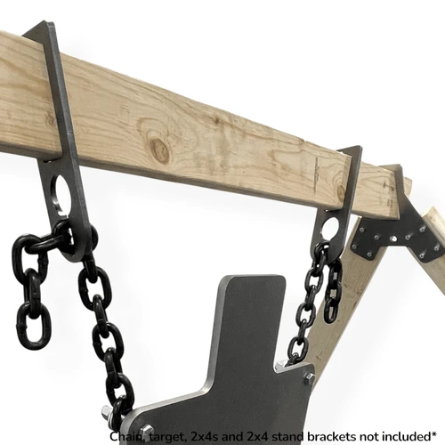 Close-up of laser-cut steel gong hanger mounted on wooden 2x4 beam, showing precise fit and chain attachment point for hanging steel shooting targets.