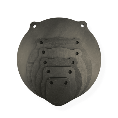 Installed AR500 steel gong target hanging from chain setup during live fire practice showing stable movement and audible ring response on impact