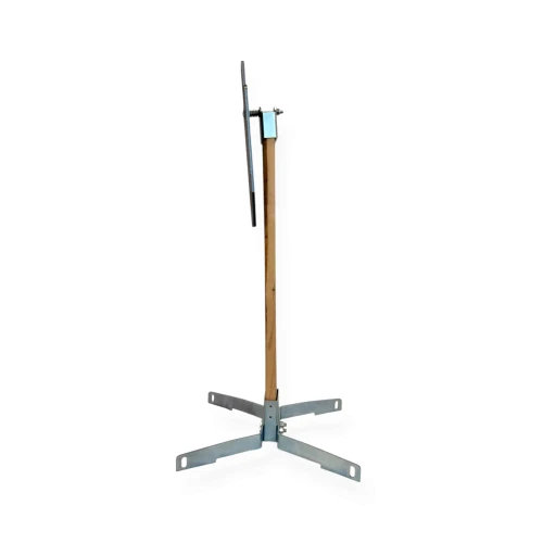 Outdoor shooting range setup featuring AR550 static target package mounted on 2x4 wood post for precision marksmanship and defensive firearm drills