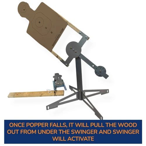 Gravity-driven swinger base installed on gravel range surface, showing stable steel frame design built for repeated impact and long-term training durability.
