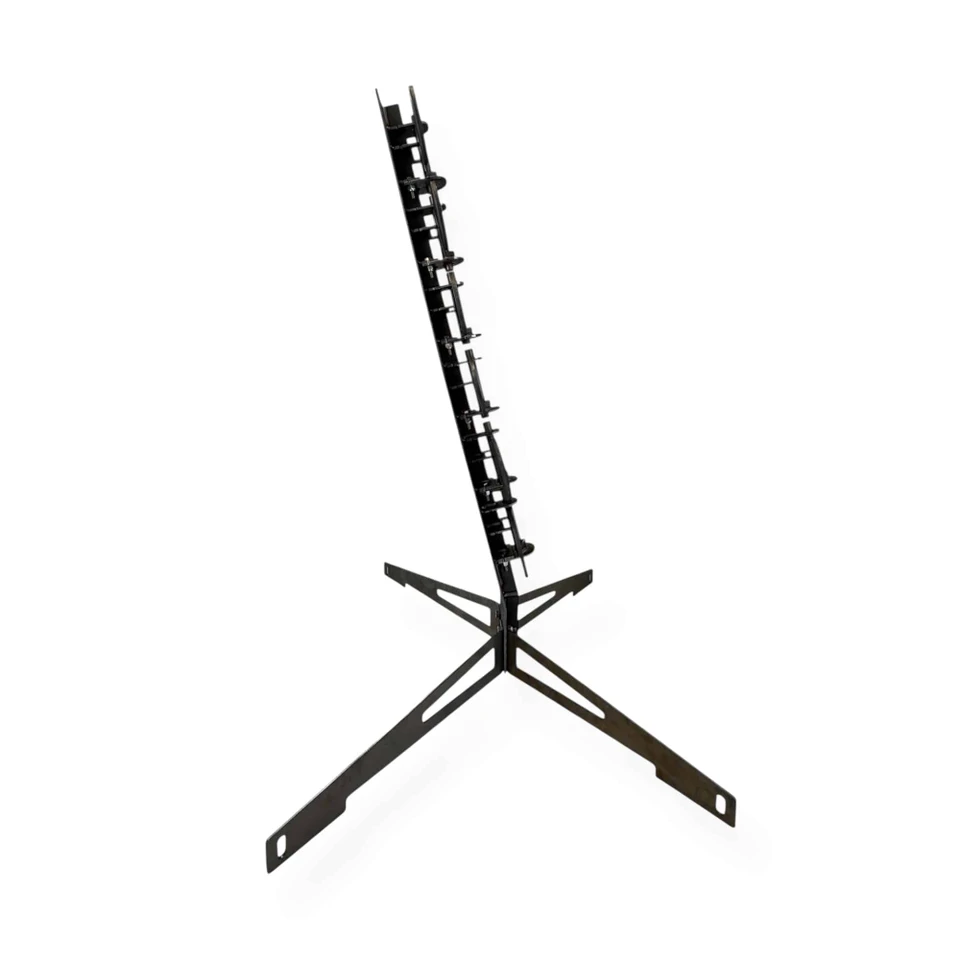 Shooter engaging AR500 dueling tree at outdoor range, steel paddles flipping side-to-side on impact during rapid pistol transitions and accuracy practice session.