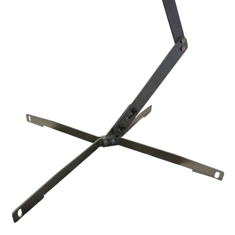 Functional impact view of rifle round striking angled steel plate, demonstrating downward deflection of bullet splash for improved shooter safety at close range.