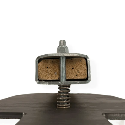 Close-up of zinc-plated Static Target Hanger showing carriage bolt, compression spring, and lock nut for tool-free steel target mounting system