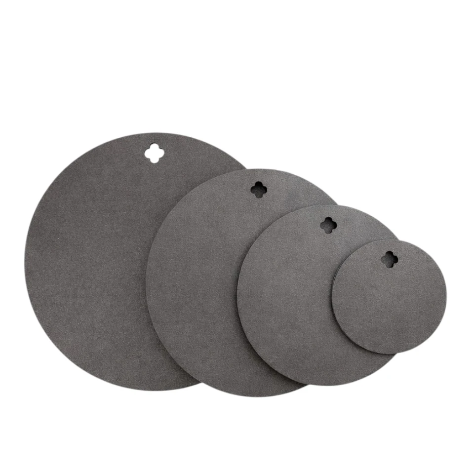 CNC laser-cut 3/8 inch AR500 steel round targets in various 5 inch, 8 inch, 10 inch and 12 inch target plates for pistol and carbine training at outdoor shooting range with clean strike surface