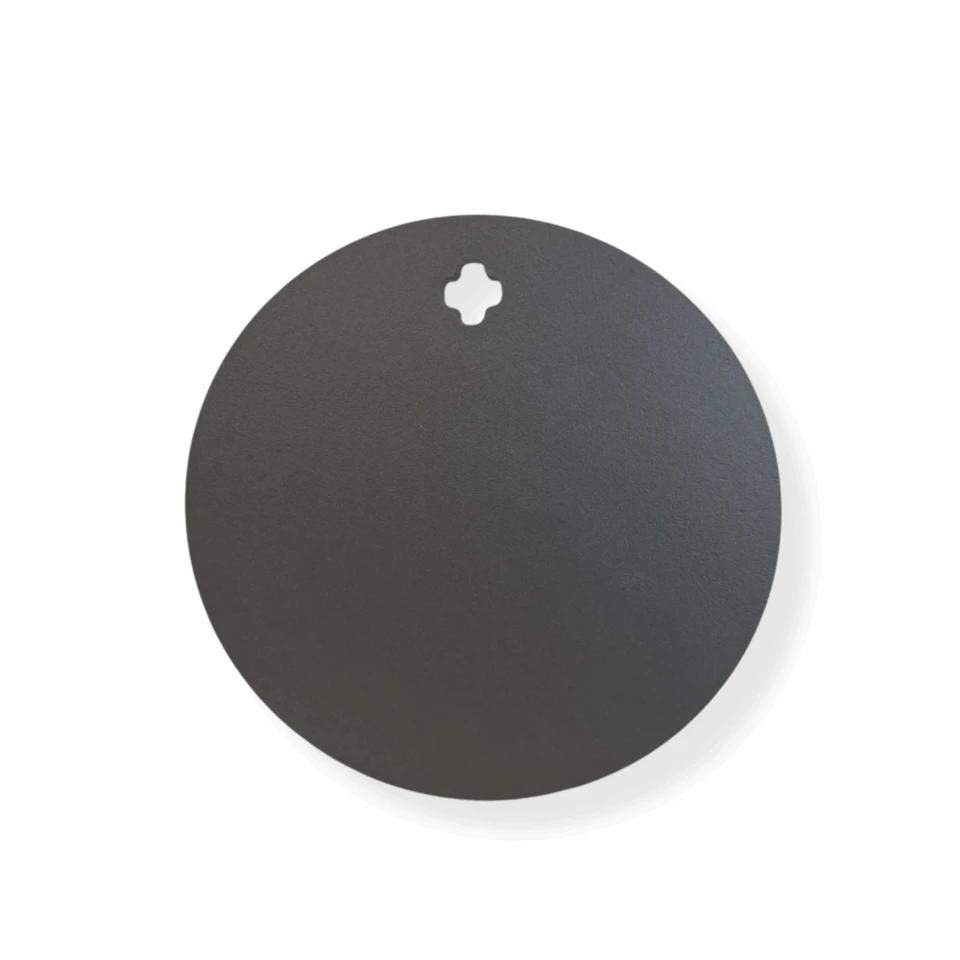 CNC laser-cut 3/8 inch AR500 steel round target mounted on range stand for pistol and carbine training at outdoor shooting range with clean strike surface