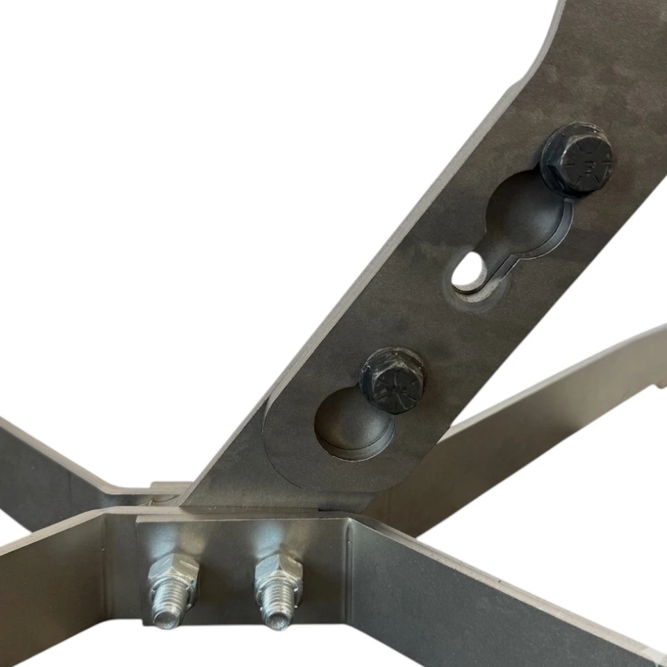 Steel gong target mounted on upright stand in open range environment, designed for long-distance rifle training up to .338 Lapua Magnum safely