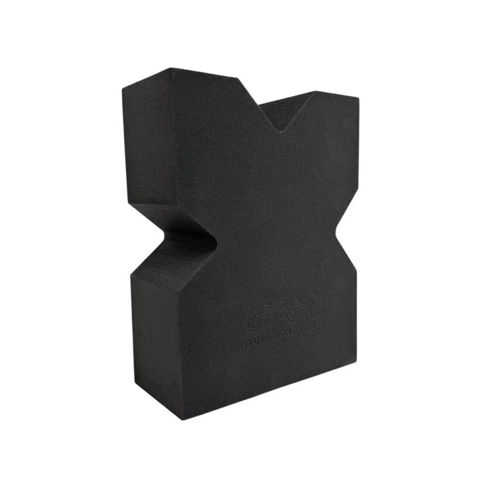 Ultra-light foam shooting rest supporting AR-style rifle on outdoor range bench, providing stable front-end support for precision target practice sessions.