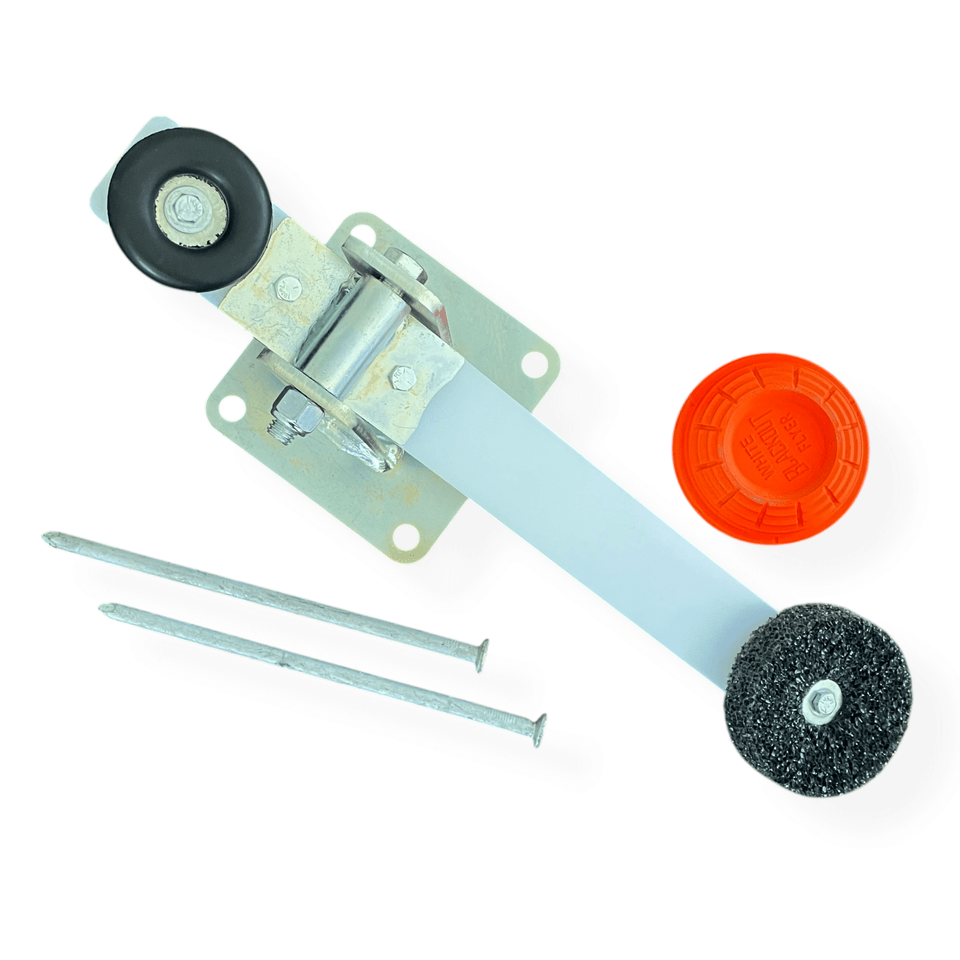 Installed range setup where pepper popper triggers clay flipper, launching clay pigeon upward for reactive aerial shooting practice drills outdoors.