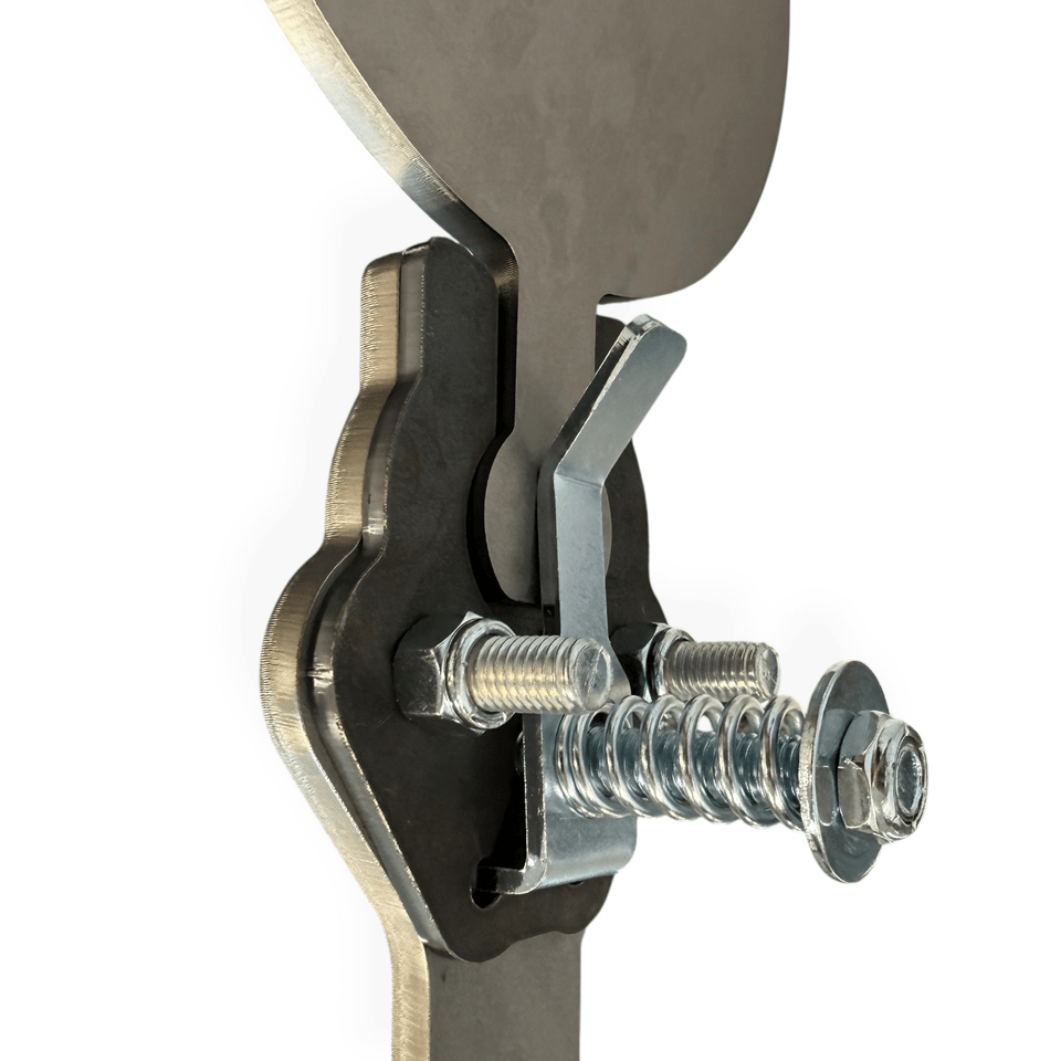 Close-up detail of CNC laser-cut hub with dual sealed bearings showing precision-machined steel components designed for smooth rotational movement under fire.