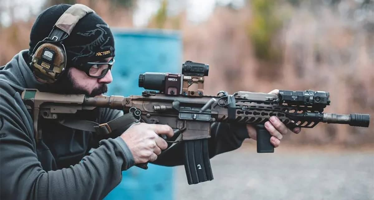 Picture of a man shooting an Ar-15