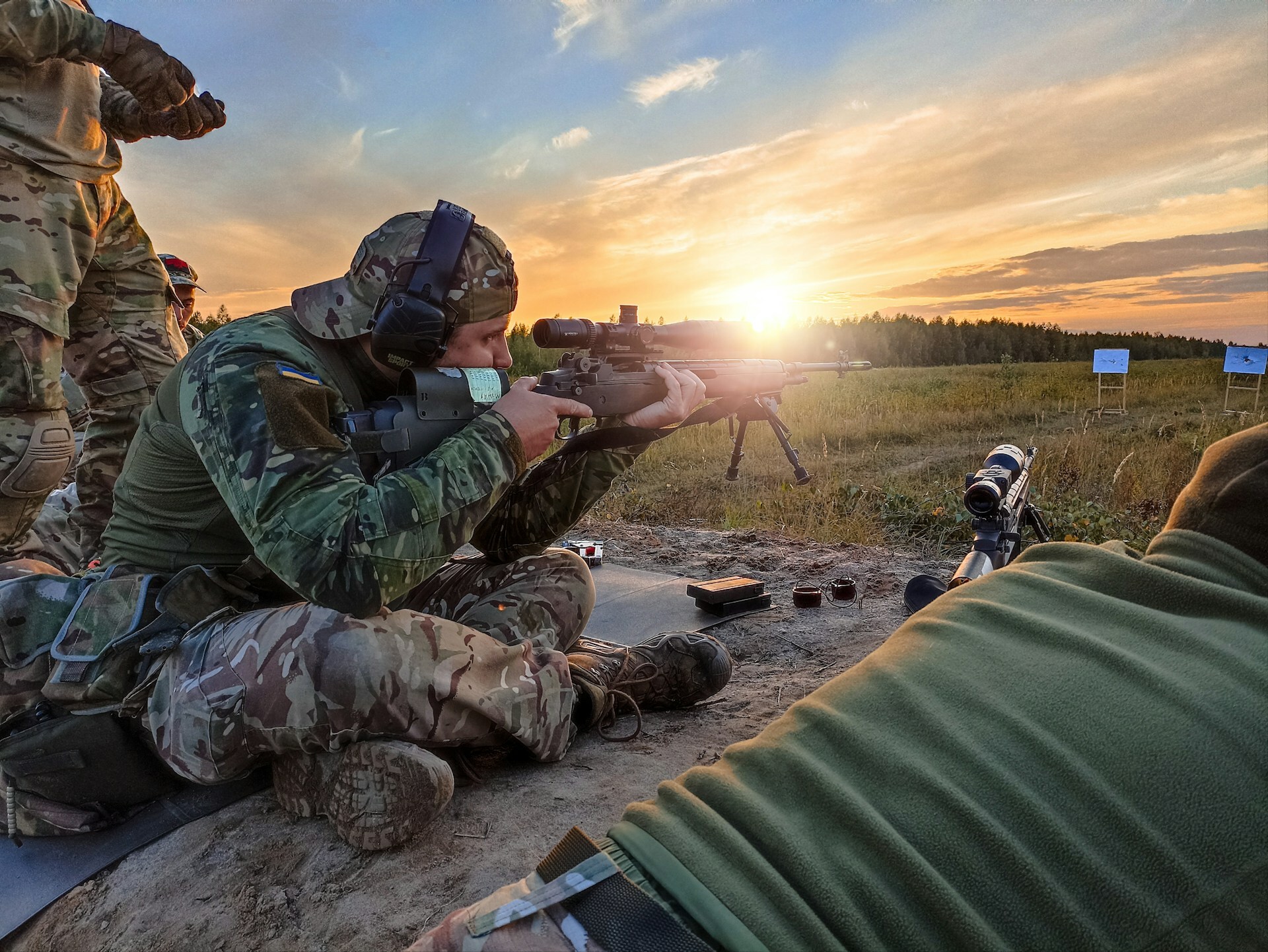 Soldier aiming gun
