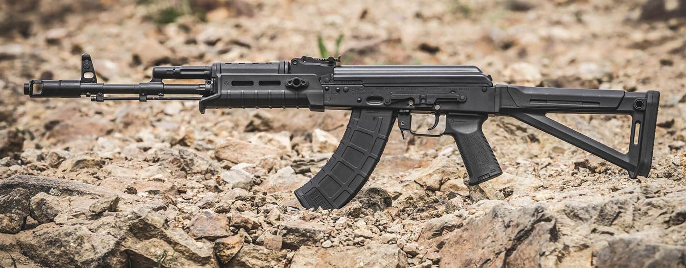 An AKM featureing Magpul AKM Handguard on a rocky ground