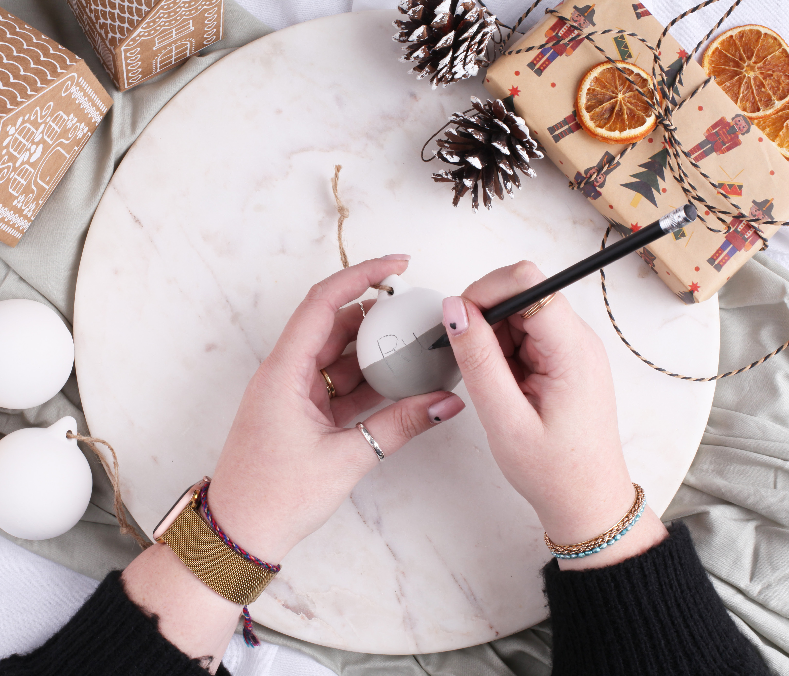 Writing on a bauble in pencil 