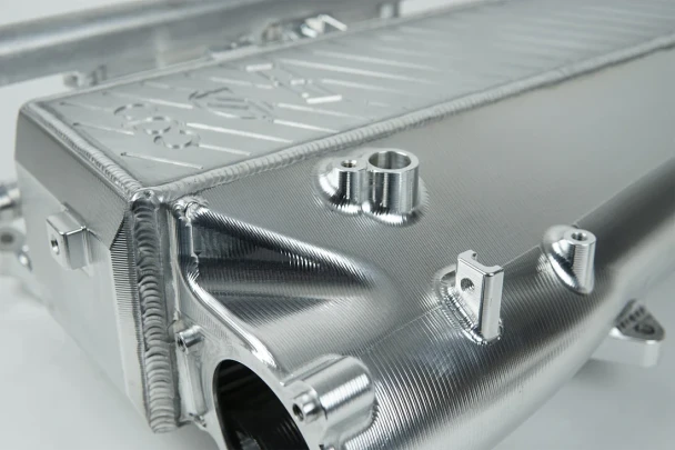 CSF-8200CAR Toyota A90/A91 Supra & BMW G-Series B58 Gen 2 Charge-Air Cooler "Super Manifold" – Candy Apple Red