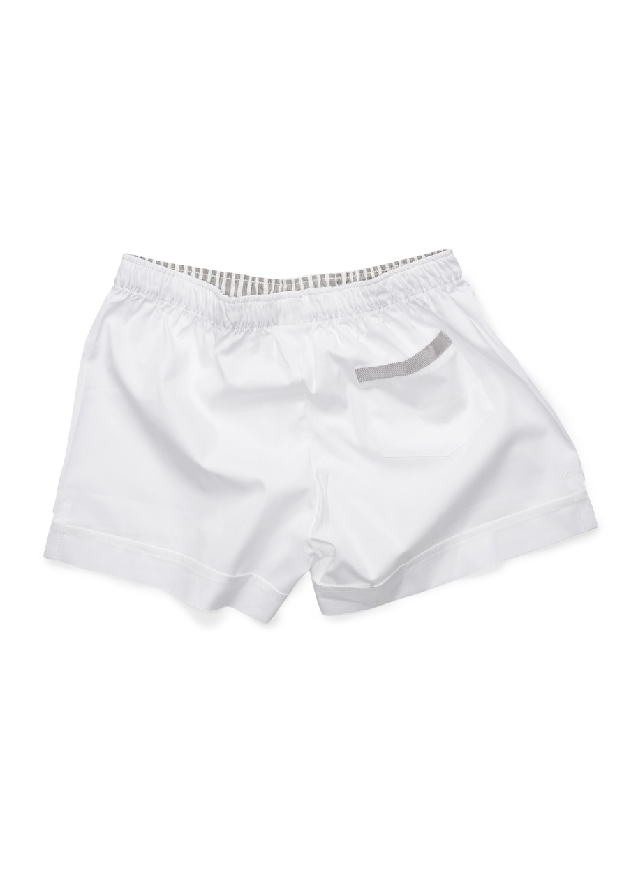 The Boxer in crisp white pinpoint, it's back pocket edged with light gray grosgrain ribbon.