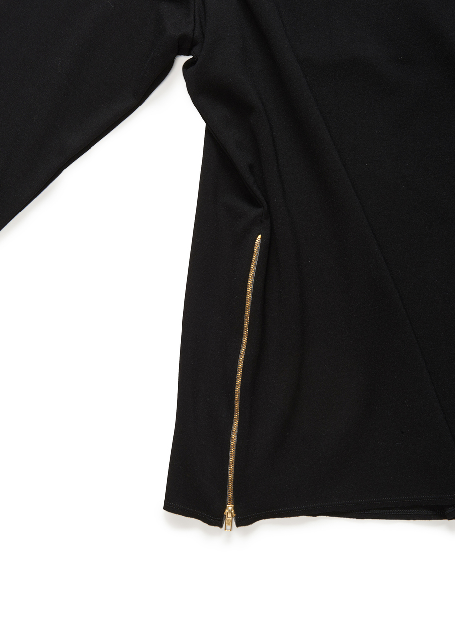The 10-inch long gold zippers, on each side seam.