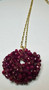 Adorn yourself with the beauty and elegance of this ruby wreath style necklace accompanied with a gold fill 21" chain.  The deep red hue of the ruby symbolizes love, passion, and vitality, making it a perfect statement peice for any occasion.  The wreath design adds a organic touch of nature inspired charm, while the gold brings a luxurious and timeless appeal.  

Whether you are attending a special evn or simply want to add a touch of pizazz to your everyday look, this ruby wreath necklase is sure to captivate and inspire.

Ruby is an excellent stone for energy.  Imparting vigor to life, it energizes and balances.

County of Origin – India, Madagascar, Russia, Sri Lanka, Cambodia, Kenya, Mexico