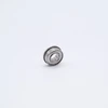 SFR168-ZZEE Stainless Steel Flanged Mini Ball Bearing 1/4x3/8x1/8+5/32  Angled View