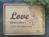 Love Grows Here Cutting Board