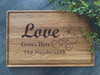 Love Grows Here Cutting Board