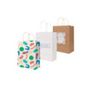 Three twisted handle kraft paper bags in different designs: colourful geometric patterns, plain white, and natural brown.