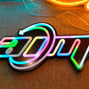 A neon LED sign featuring vibrant multi-coloured lighting with a black background and a logo design.