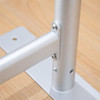A silver metal base with a connecting bracket, designed for stability and support in barrier installations.
