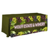 A 6ft tablecloth in green featuring a grapevine design and a logo.