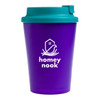A reusable coffee cup with a purple body and a teal comfort lid, featuring the logo "homey nook" on the front.
