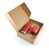 A red drink bottle and a red tumbler inside a cardboard gift box with an open lid. The box has a logo.