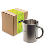 A stainless steel coffee mug alongside a cardboard box featuring a colourful design and a logo.