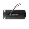 A black wireless speaker with a textured surface and a carrying strap, featuring a branding logo.