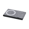 A grey wireless charger with a simple circular logo design, featuring a textured fabric finish.