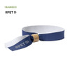 A navy blue and white wristband with a bamboo clasp and branding. Made from recycled materials.