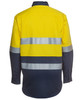 A long-sleeve work shirt in bright yellow and navy blue with reflective stripes and a logo.