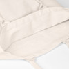A beige tote bag with no gusset, featuring interior seams and soft fabric. It has a logo and long handles.